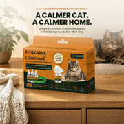The CalmGuard cat calming pheromone diffuser kit carton on an oak console in a warm living room, with a tabby cat settled calmly behind it
