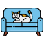 Cartoon dog sitting on a blue couch
