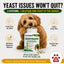Dog enjoying a YeastGuard chewable tablet